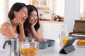 Happy asian lesbian woman couple video chat with friend in breakfast time at house in morning with love and tender.LGBTQ lifestyle