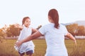 Happy asian little child girls running to their mother Royalty Free Stock Photo