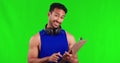 Happy asian man, clipboard and pointing to you on green screen for fitness signup against a studio background. Portrait