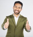 Happy asian man, portrait and thumbs up in thank you, winning or success against a white studio background. Businessman Royalty Free Stock Photo