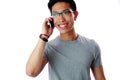 Happy asian man talking on the phone Royalty Free Stock Photo