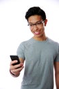 Happy asian man using smartphone Royalty Free Stock Photo