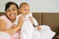 Happy Asian mother and baby Royalty Free Stock Photo