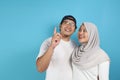 Happy Asian Muslim Couple Dreaming Royalty Free Stock Photo