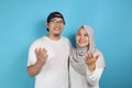 Happy Asian Muslim Couple Dreaming Royalty Free Stock Photo