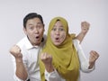 Happy Asian Muslim Couple Shows Winning Gesture Royalty Free Stock Photo