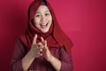 Happy Asian Muslim Woman Clapping Hands