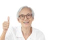 Happy asian old elderly wearing spectacles,raising hand sign,showing great thumbs up,smiling senior woman giving a thumbs up