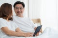 Happy Asian senior people having good time at home Royalty Free Stock Photo