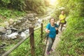 Happy Asian senior couple hiking in nature park Royalty Free Stock Photo