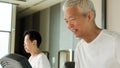 Happy Asian senior couple running on treadmill healthy lifestyle Royalty Free Stock Photo