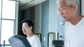 Happy Asian senior couple running on treadmill healthy lifestyle Royalty Free Stock Photo