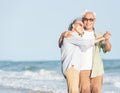 Happy Asian senior man and woman couple smile dancing resting relax on the beach Royalty Free Stock Photo