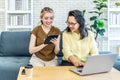 Happy asian senior mother and young woman daughter shopping online with laptop computer and tablet at home. Asian family making Royalty Free Stock Photo