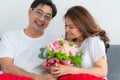 Happy Asian senior people having good time at home Royalty Free Stock Photo