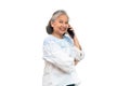 Happy Asian senior woman holding smartphone and using online apps in mobile phone and texting sms message chatting on isolated Royalty Free Stock Photo