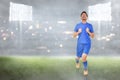 Happy asian soccer player celebrate his goals Royalty Free Stock Photo