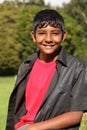 Happy Asian teenager outdoors in country sunshine Royalty Free Stock Photo