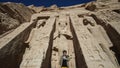 Happy Asian tourist woman travel to Egypt Abu Simbel internation historic handmark Royalty Free Stock Photo