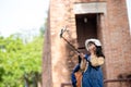 Happy Asian traveler girl takes a photo with a smartphone camera