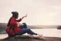 Happy Asian woman backpacker relaxing on holiday travel concept Royalty Free Stock Photo