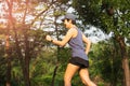 Happy asian woman exercise walking in public park workout concept. Royalty Free Stock Photo