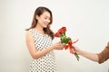 Happy asian woman getting flowers from her boyfriend Royalty Free Stock Photo