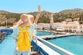 Asian woman in hat enjoying travel and vacation on Cruise ship. Tourist girl on the deck Royalty Free Stock Photo