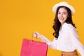 Happy asian woman holding shoppingbag with mid year sale