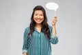 Happy asian woman holding speech bubble Royalty Free Stock Photo