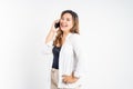 happy asian woman making a call using a cell phone Royalty Free Stock Photo