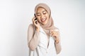 happy asian woman making a call using a cell phone Royalty Free Stock Photo