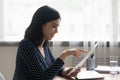 Happy asian woman read good news in postal correspondence