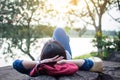 Happy Asian woman relaxing on holiday travel concept Royalty Free Stock Photo