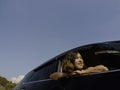 Happy Asian woman short hair traveling by car. Royalty Free Stock Photo