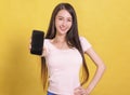 Happy asian woman showing  blank screen of  mobile phone Royalty Free Stock Photo
