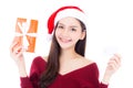 Happy asian woman with smile holding gift box and credit card of xmas Royalty Free Stock Photo