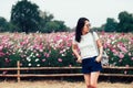 Happy Asian Woman With Sunglasses Having Fun With Cosmos Flowers Garden