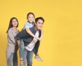 Happy Asian young family with one child standing embracing and smiling Royalty Free Stock Photo