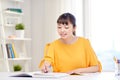 Happy asian young woman student learning at home Royalty Free Stock Photo