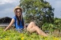 Happy Asians female in cowgirl hat and wear glasses looking at Royalty Free Stock Photo