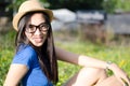 Happy Asians female in cowgirl hat and wear glasses looking at Royalty Free Stock Photo