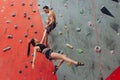 Happy athletes performing dangreous movements while climbing Royalty Free Stock Photo