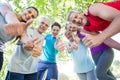 Happy athletic group with thumbs up