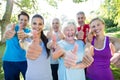 Happy athletic group with thumbs up