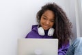 Happy attractive african american girl working office work remotely from home Black woman using laptop computer Distance Royalty Free Stock Photo