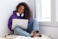 Happy attractive african american girl working office work remotely from home Black woman using laptop computer Distance Royalty Free Stock Photo