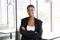 Happy attractive African business leader woman looking at camera