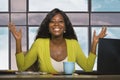 Happy and attractive black African American business woman smiling confident working at office computer desk in successful Royalty Free Stock Photo
