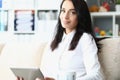 Happy attractive business woman holding tablet closeup